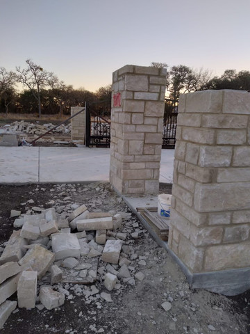 Limestone entry columns under construction